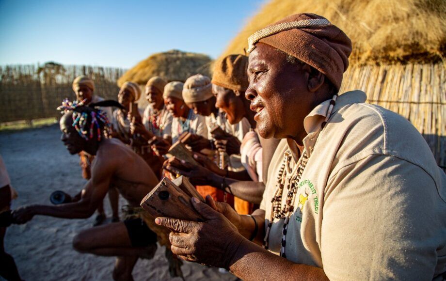 Khwai sitting in a row in a traditional village in Botswana
